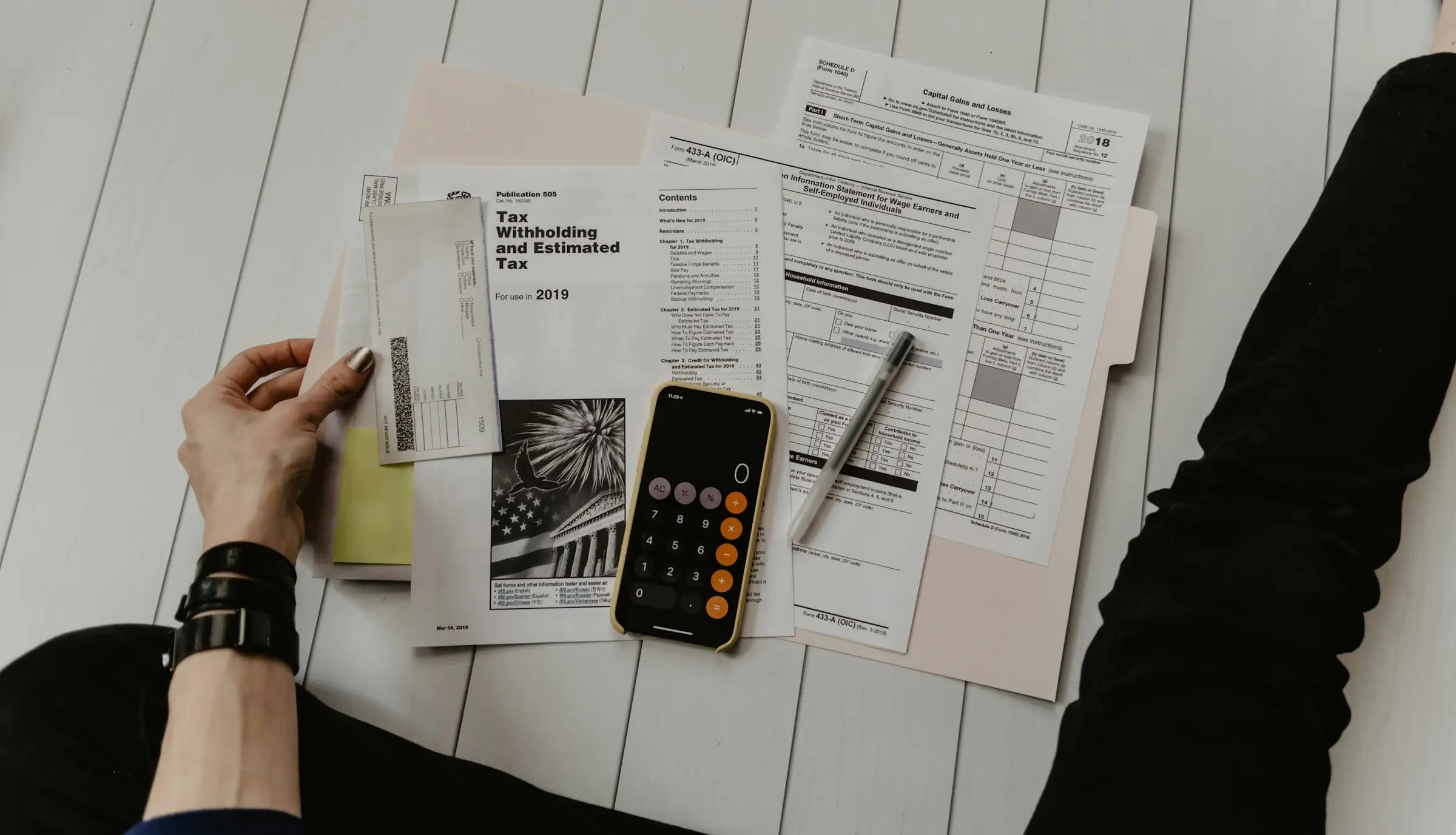 Illustration of a person analyzing a bank statement with a phone